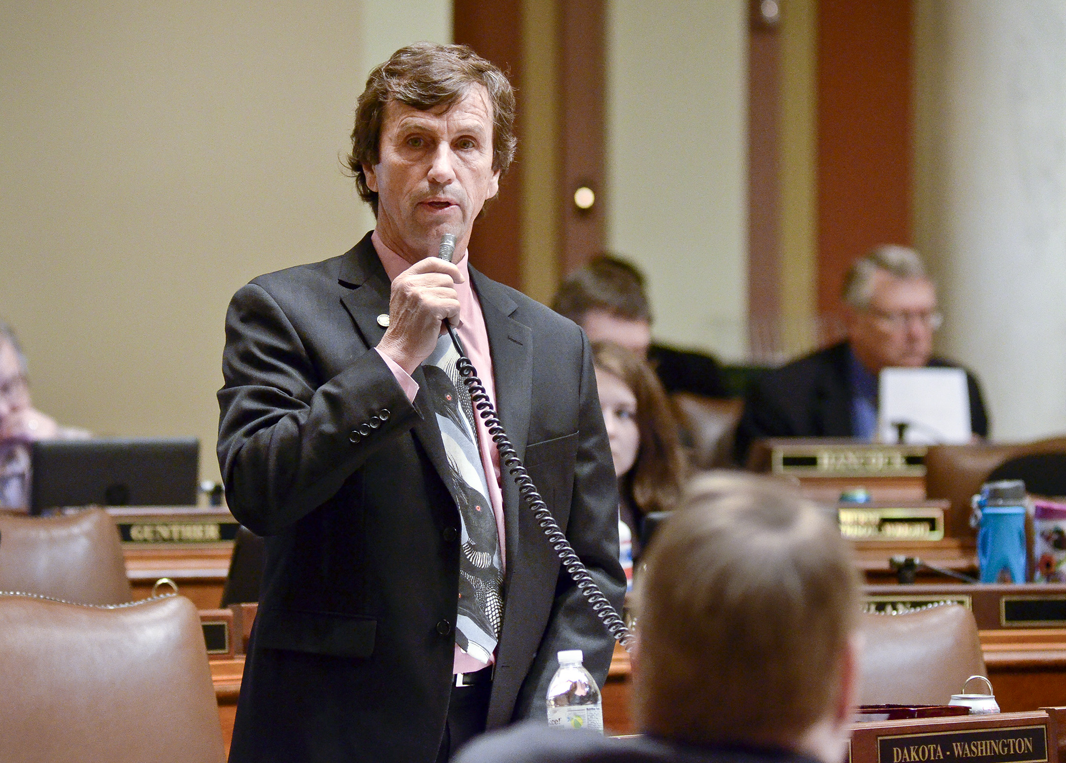 Rep. Denny McNamara presents the omnibus environment and natural resources finance bill on the House floor April 24. Photo by Andrew VonBank